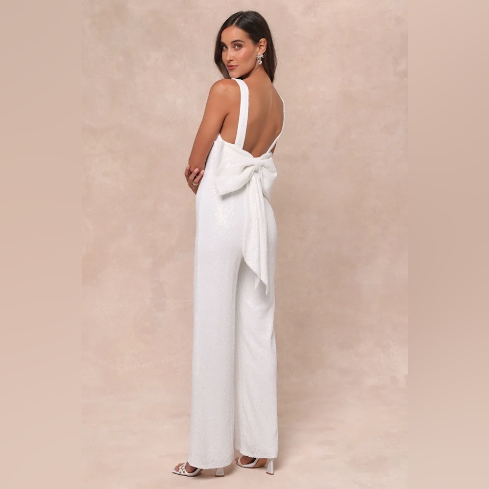 Lulus white sequin low back Jumpsuit with detachable Bow NWOT